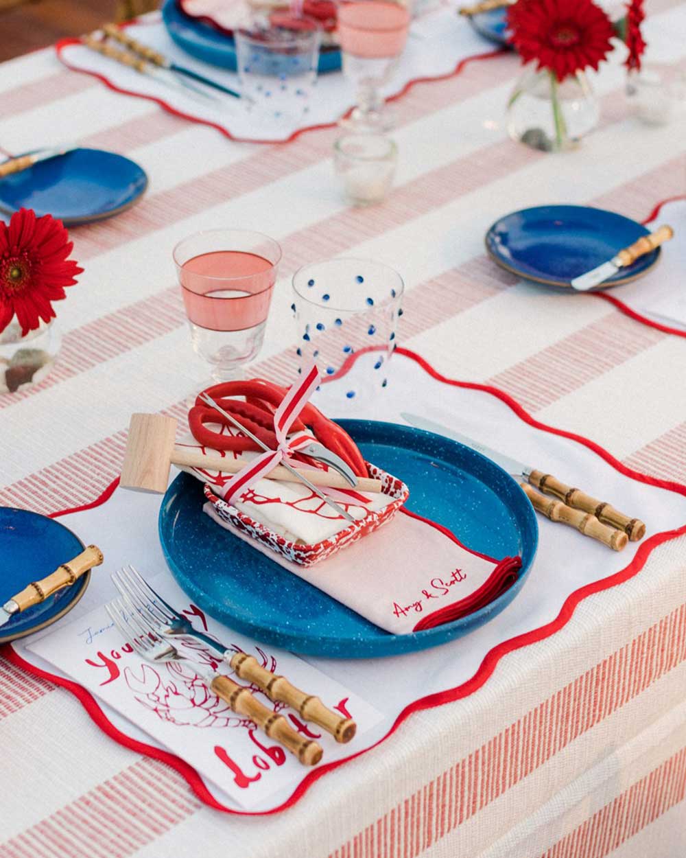 Wedding table setting with cloth napkins with custom monogramming from Atelier Saucier, Los Angeles-based tabletop brand.